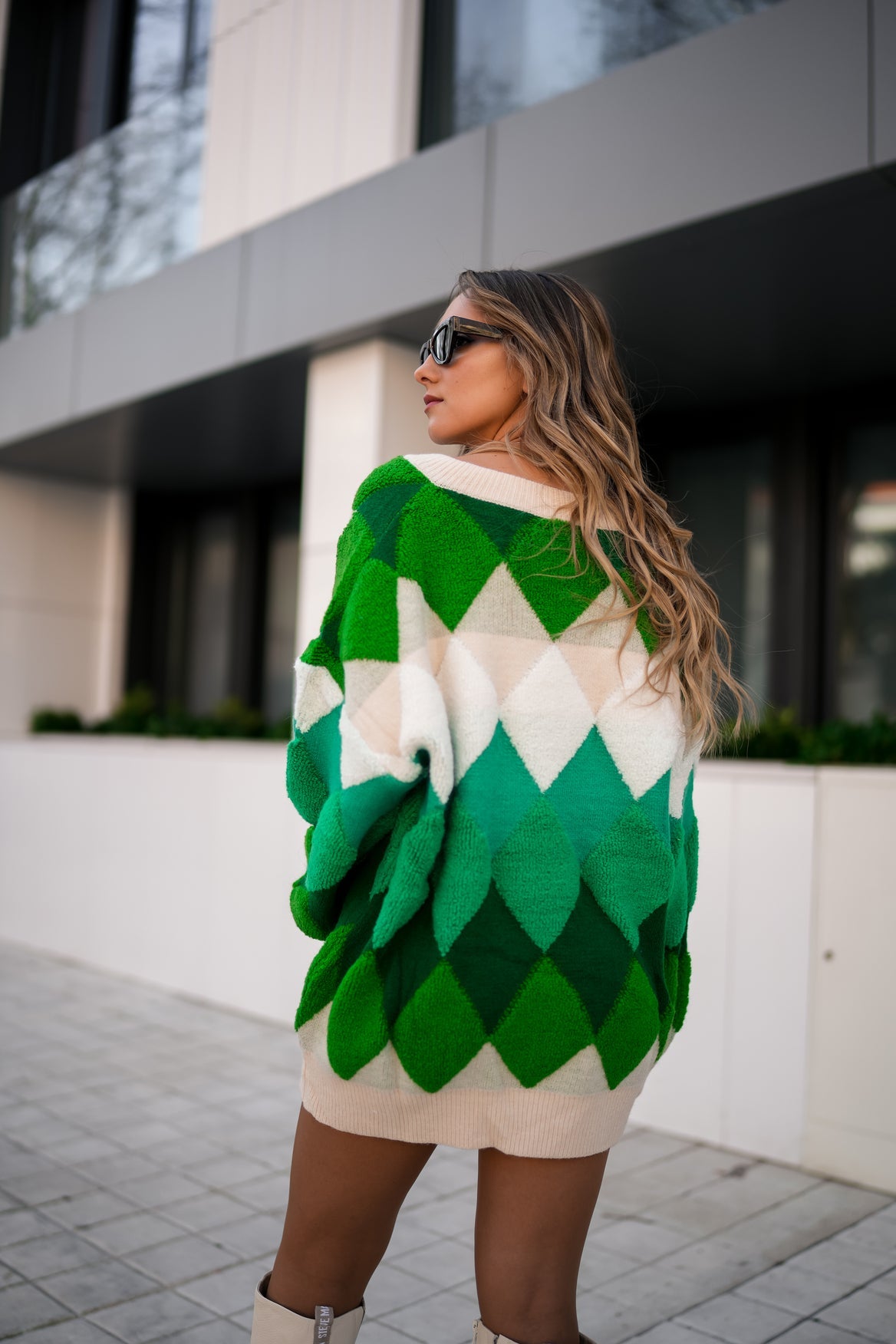 Knitted sweater with rhombuses